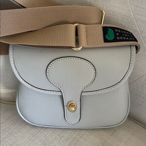 Dooney & Bourke Light Gray Crossbody Bag with Tan Strap
